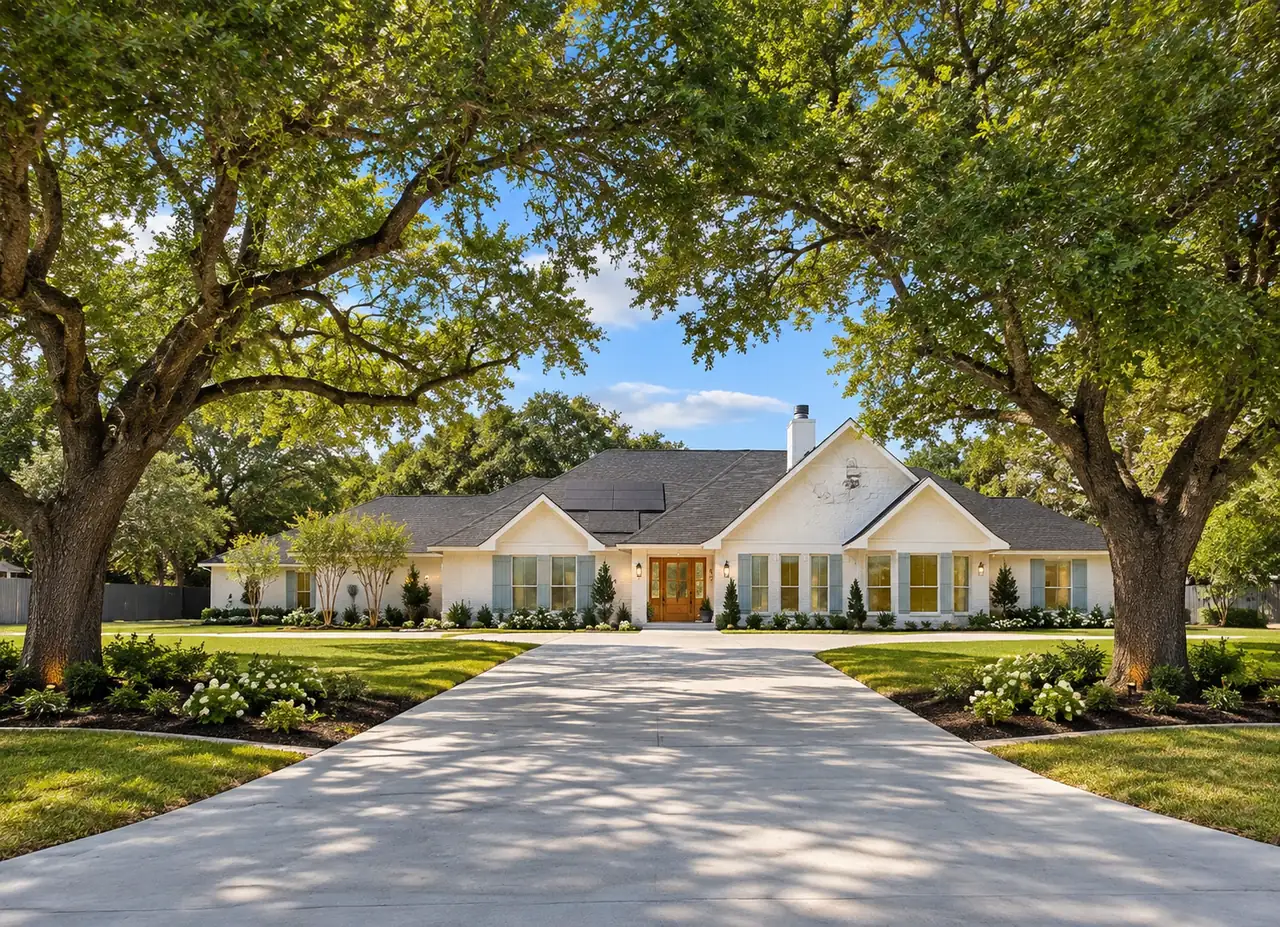 Rendering of Kuno Haus, a 16-resident assisted living home in Cypress, TX, with a long driveway lined by live oak trees